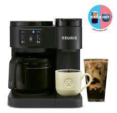 Keurig K-Duo Coffee Maker featuring single-serve and carafe options, with a cup of coffee and iced drink.
